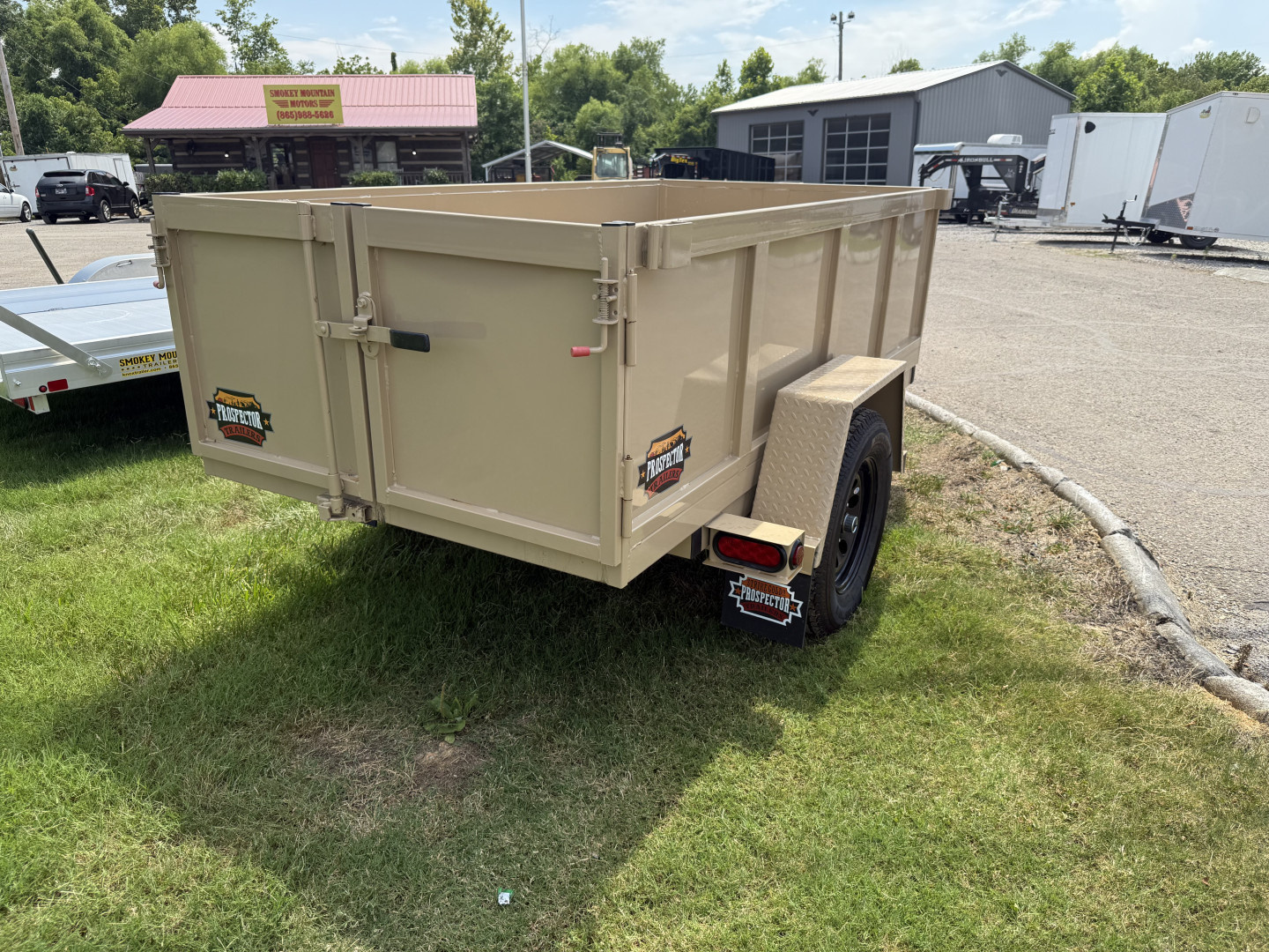 New 2025 Prospector 4X8 MANUAL DUMP 24" SIDES Dump Trailer