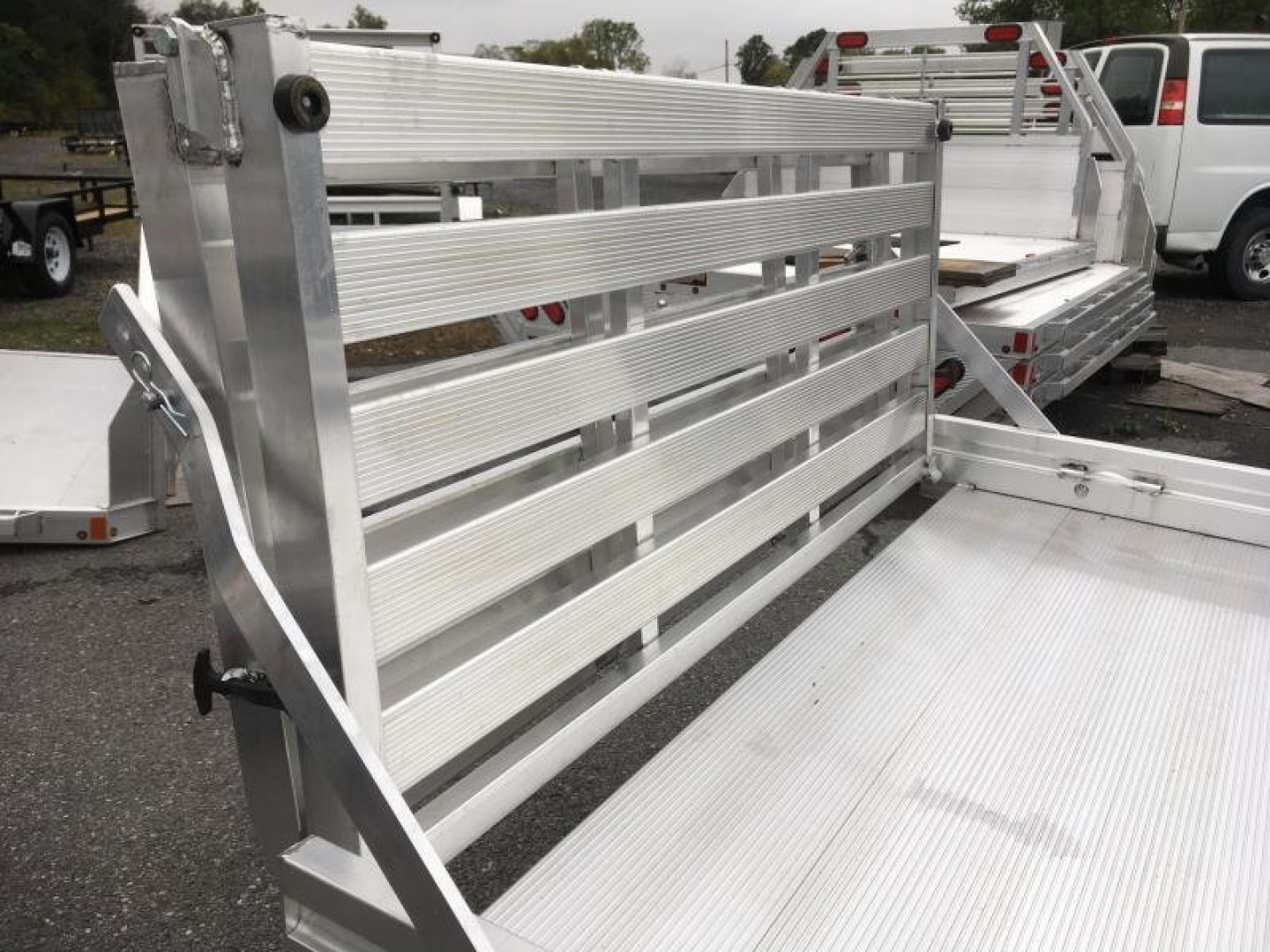 New 2025 Aluma 68" x 10' H w/ Bi-Fold Tailgate Utility Trailer