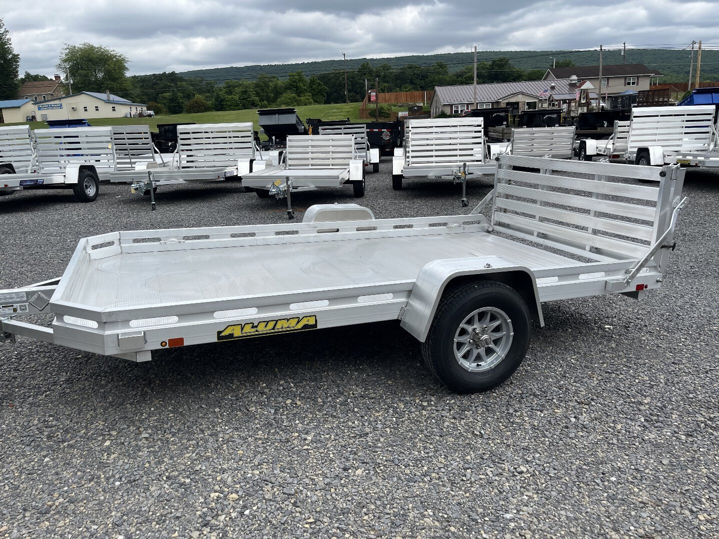 New 2025 ALUMA 77" x 12 - BI-FOLD TG Utility Trailer