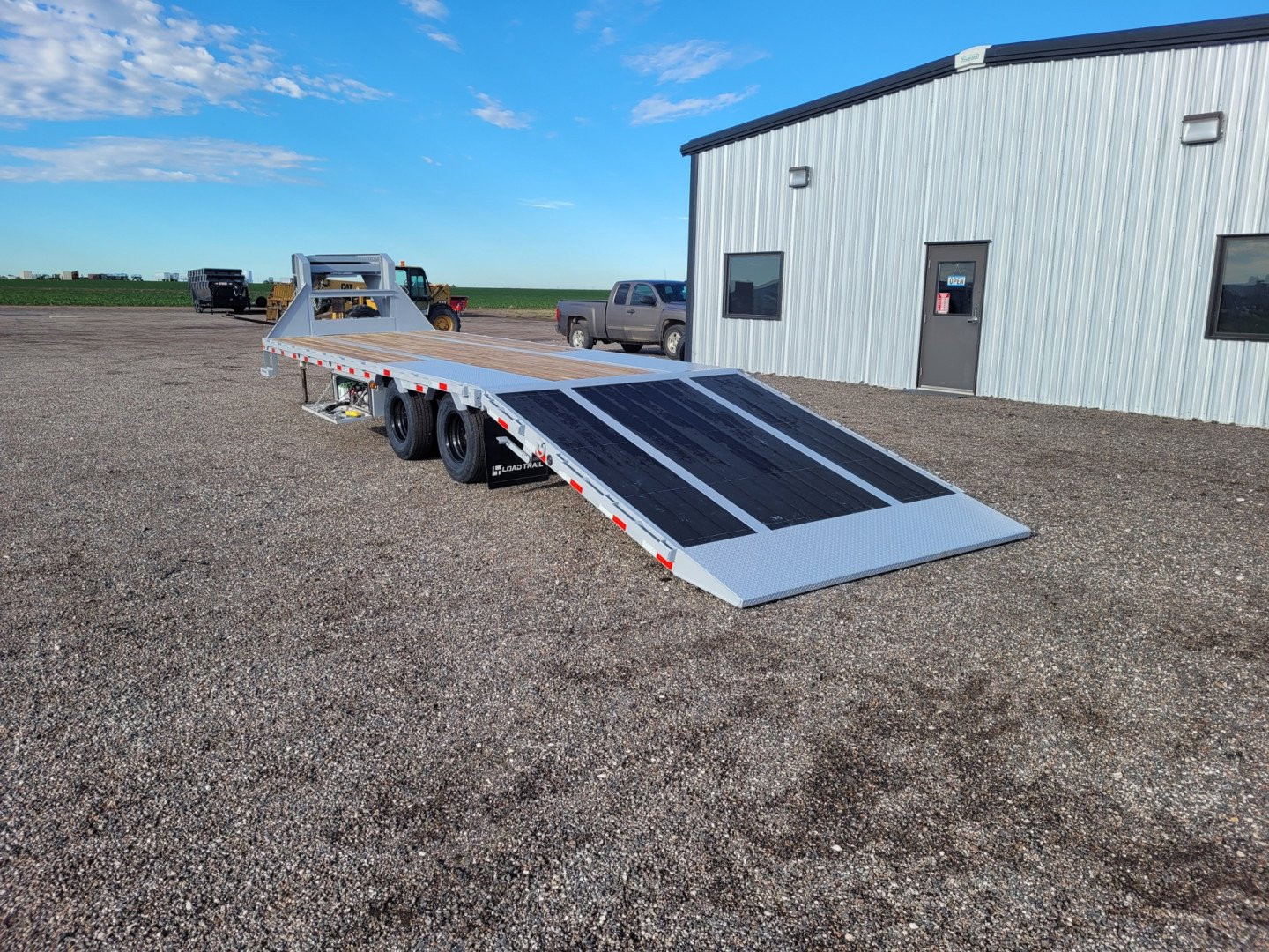 New 2025 LOAD TRAIL 102" X 32' LOW-PRO HYD DOVETAIL TRAILER