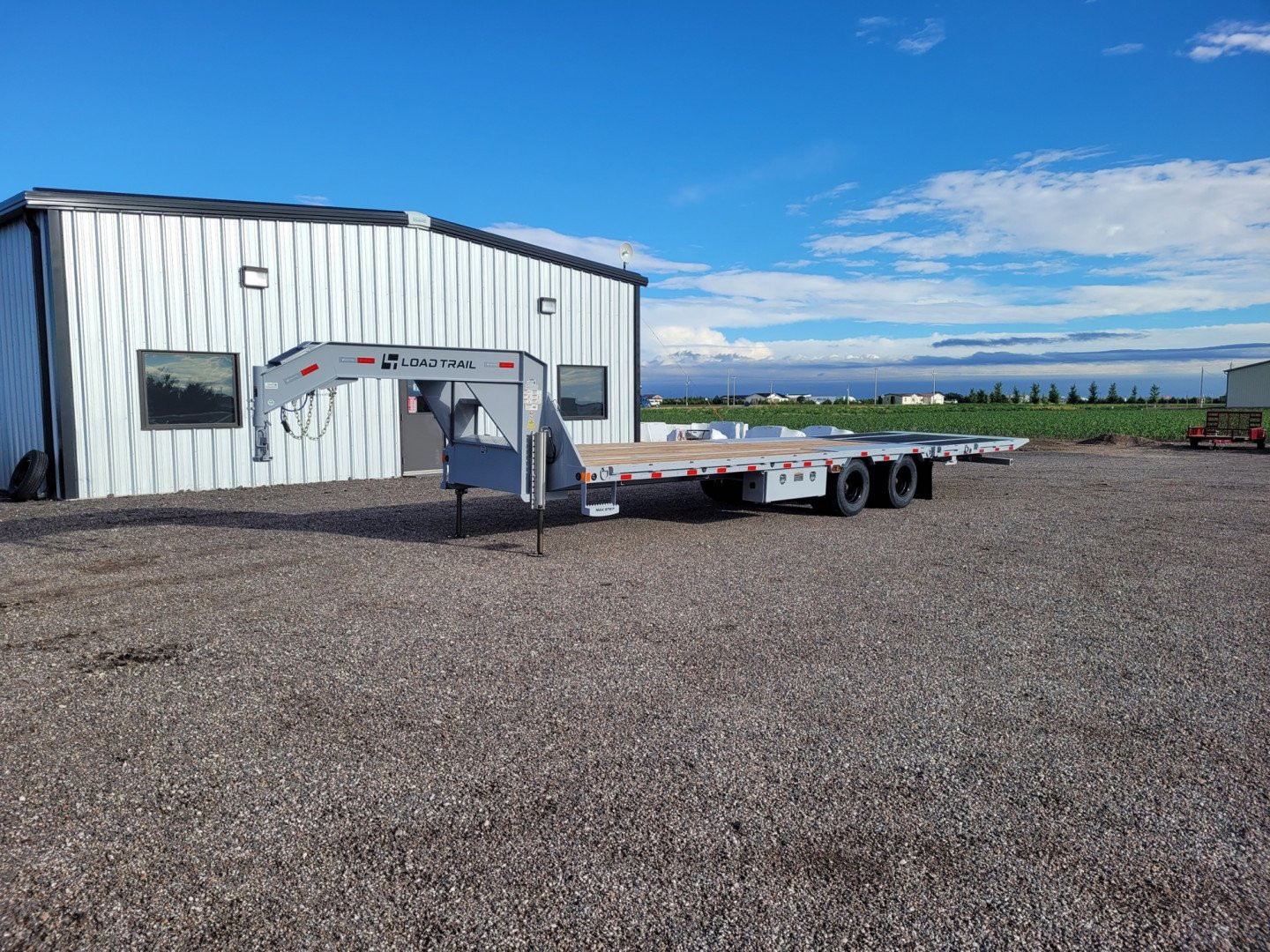 New 2025 LOAD TRAIL 102" X 32' LOW-PRO HYD DOVETAIL TRAILER