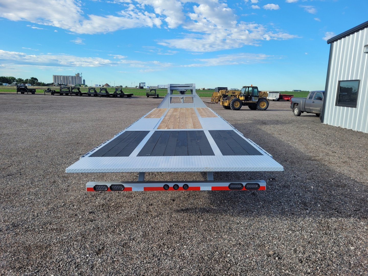 New 2025 LOAD TRAIL 102" X 32' LOW-PRO HYD DOVETAIL TRAILER