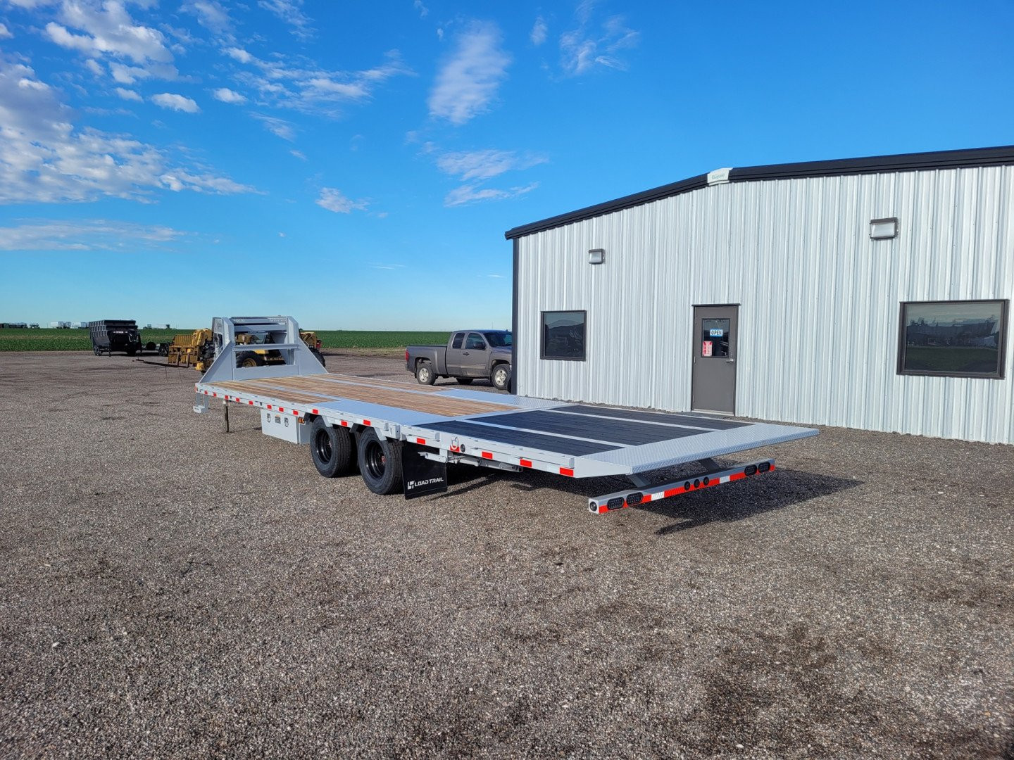 New 2025 LOAD TRAIL 102" X 32' LOW-PRO HYD DOVETAIL TRAILER