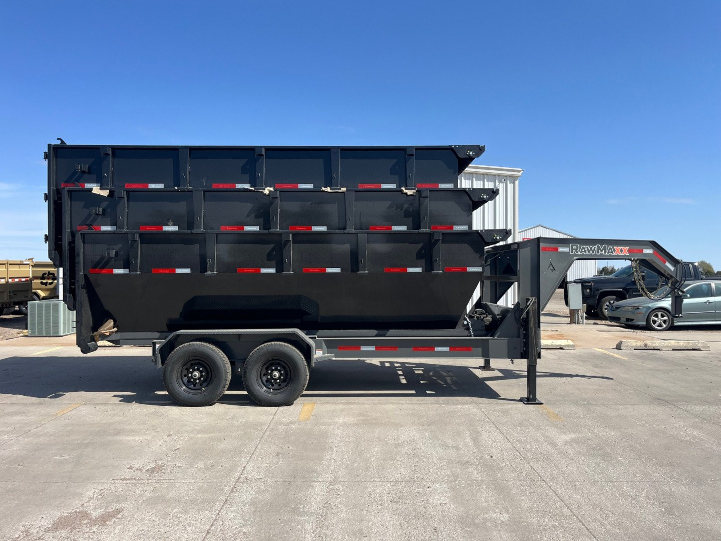 New 2025 RawMaxx Roll Off Dump Trailer