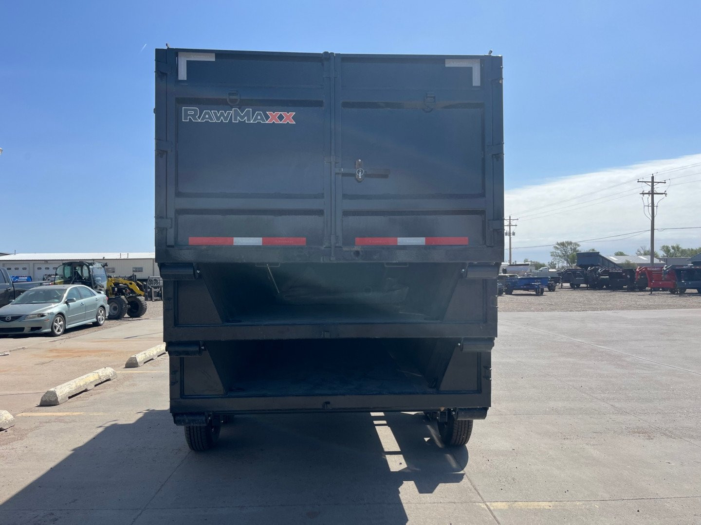 New 2025 RawMaxx Roll Off Dump Trailer