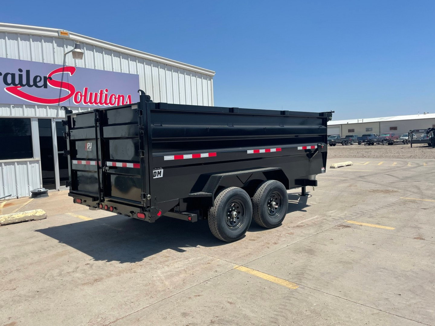 New 2025 PJ Trailers DM142 Dump Trailer