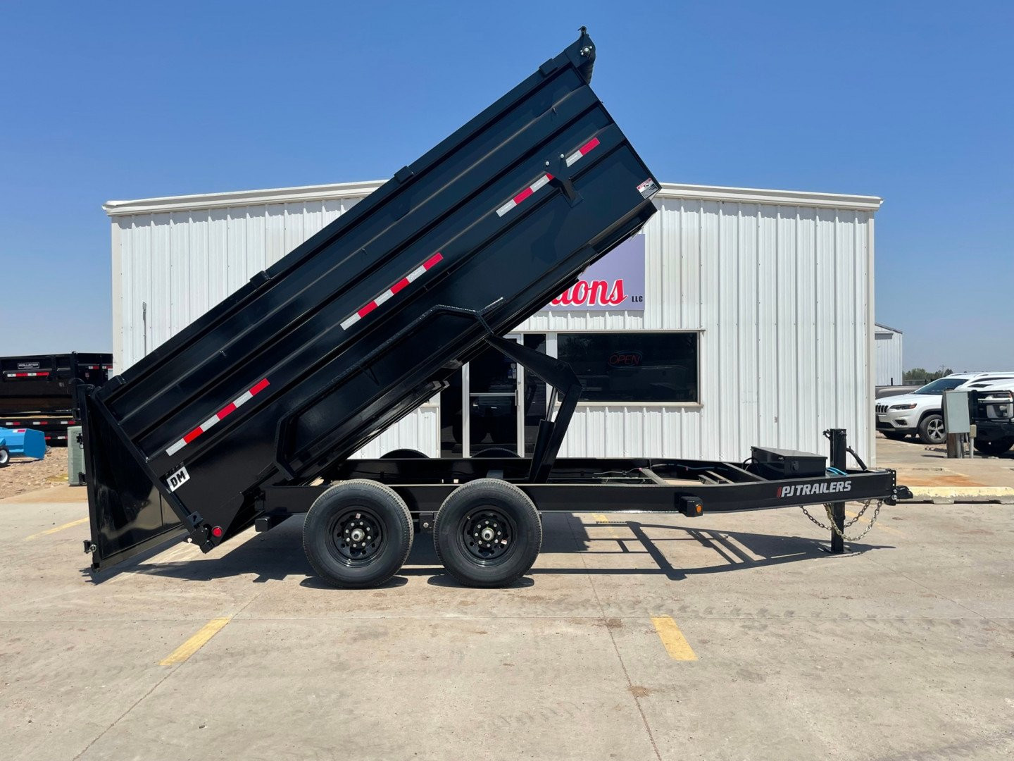 New 2025 PJ Trailers DM142 Dump Trailer