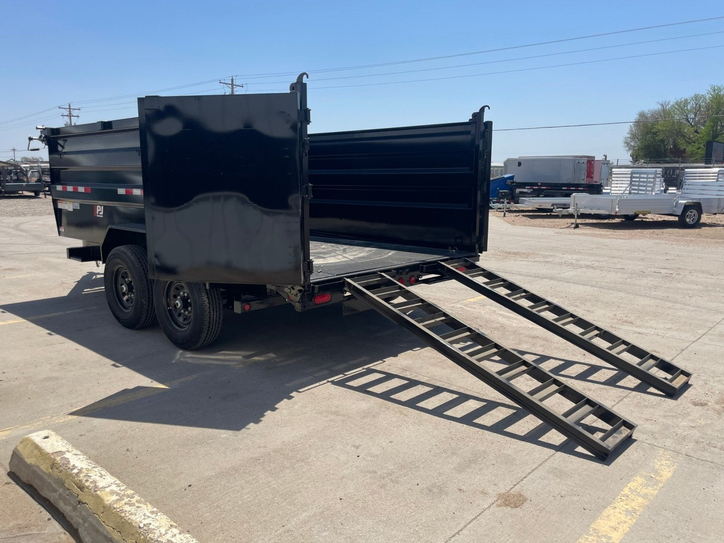 New 2025 PJ Trailers DM142 Dump Trailer