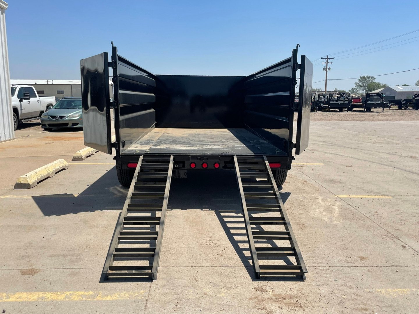 New 2025 PJ Trailers DM142 Dump Trailer