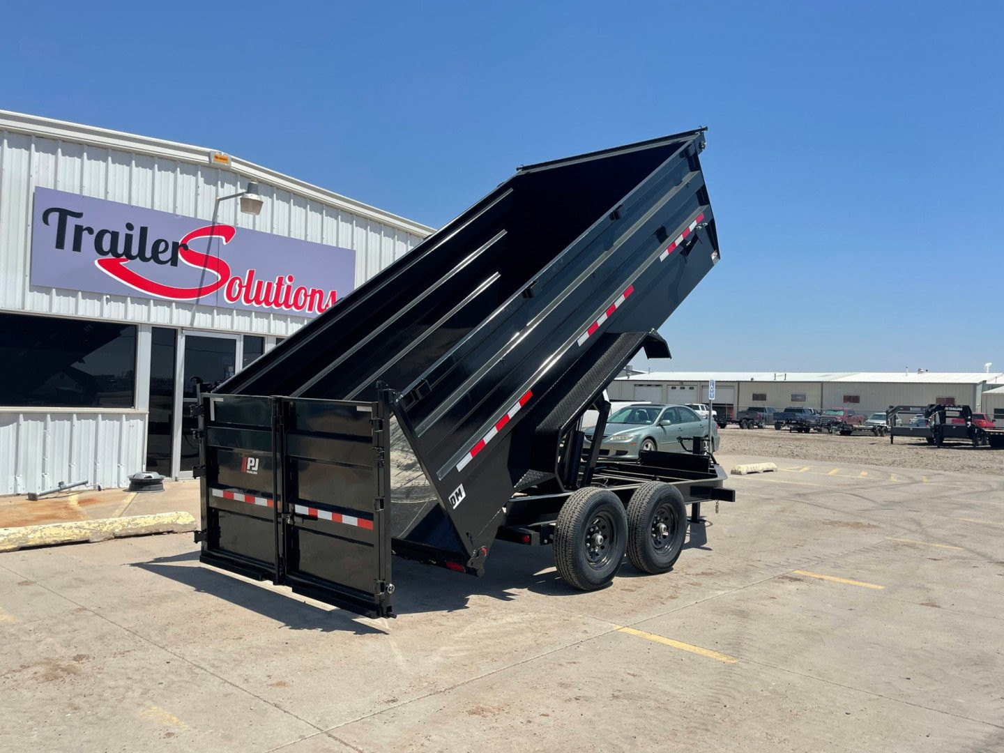 New 2025 PJ Trailers DM142 Dump Trailer