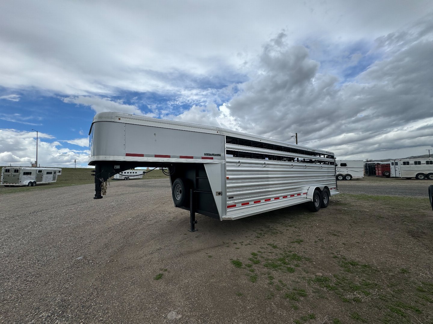 New 2024 Logan Coach Cattleman 24' Stock Trailer