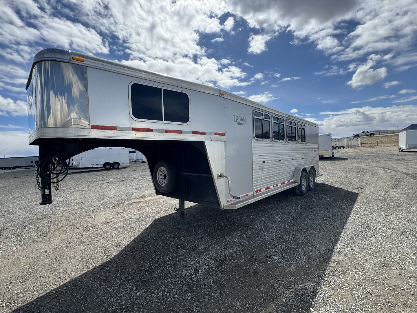 Used 2009 Logan Coach 4H Razor GN Horse Trailer for sale in Three Forks, MT