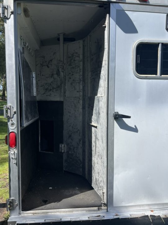 Used 1999 Featherlite Trailers 8 horse w/midtack and dressing room Horse Trailer