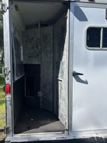 Used 1999 Featherlite Trailers 8 horse w/midtack and dressing room Horse Trailer