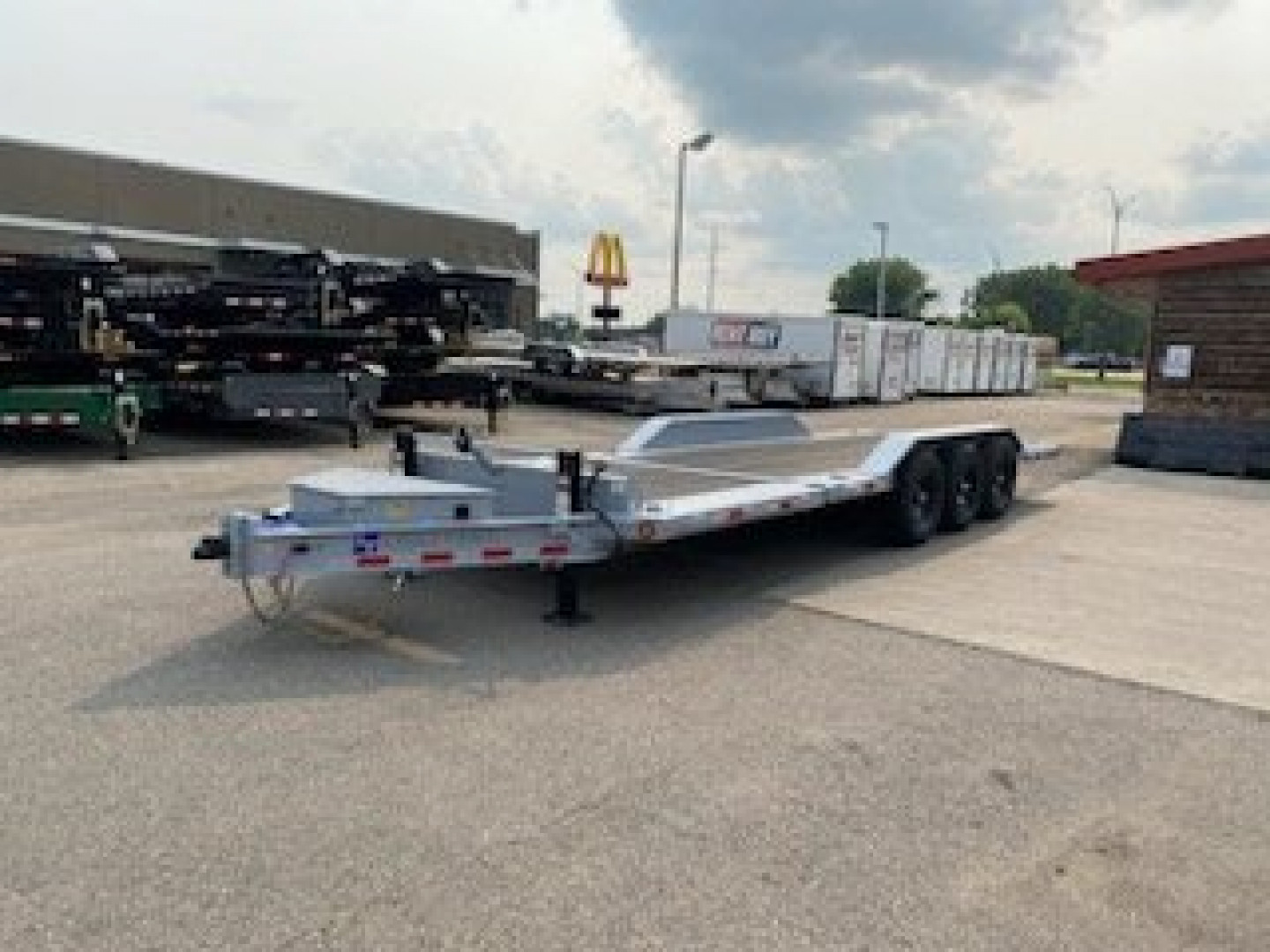 New 2024 LOAD TRAIL 102" X 24' TILT-N-GO TRIPLE AXLE TILT DECK I-BEAM FRAME