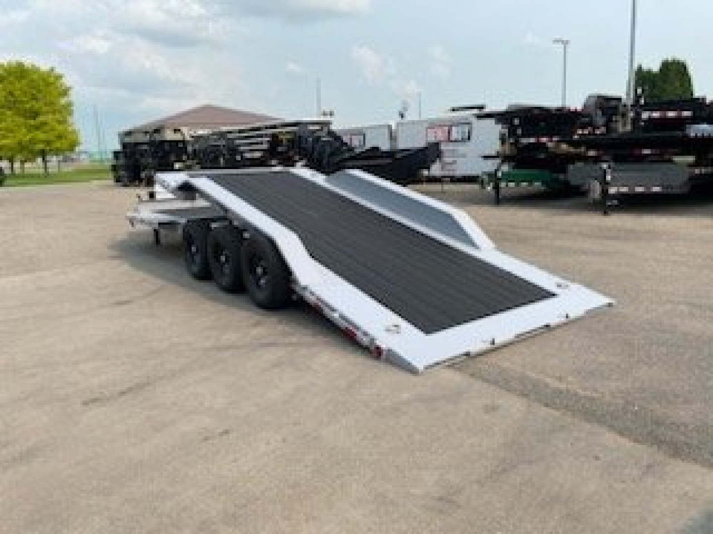 New 2024 LOAD TRAIL 102" X 24' TILT-N-GO TRIPLE AXLE TILT DECK I-BEAM FRAME
