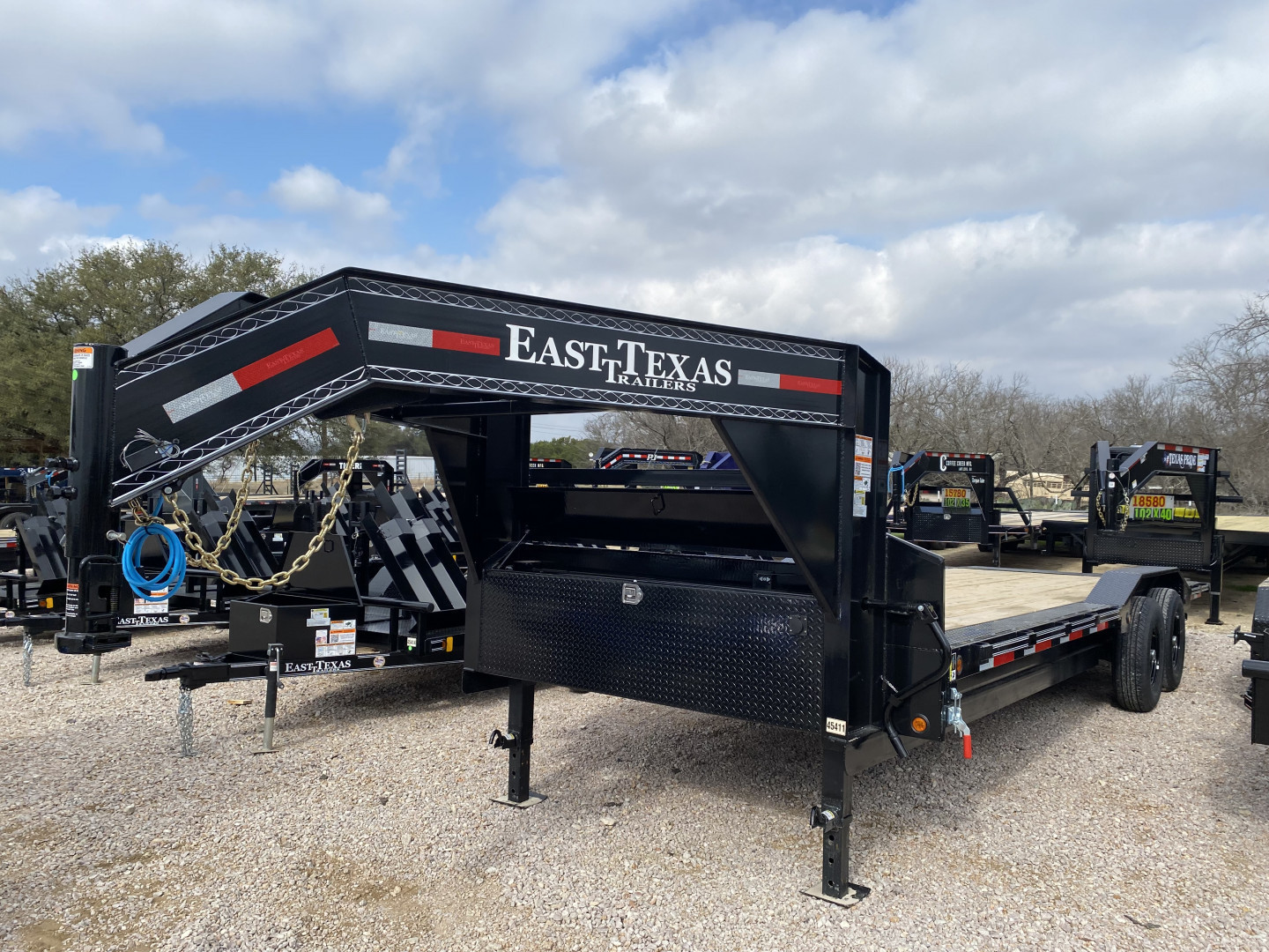 New 2025 East Texas Trailers - Drive Over Fender Power Tilt - 102 X 24 - Deckover Trailer