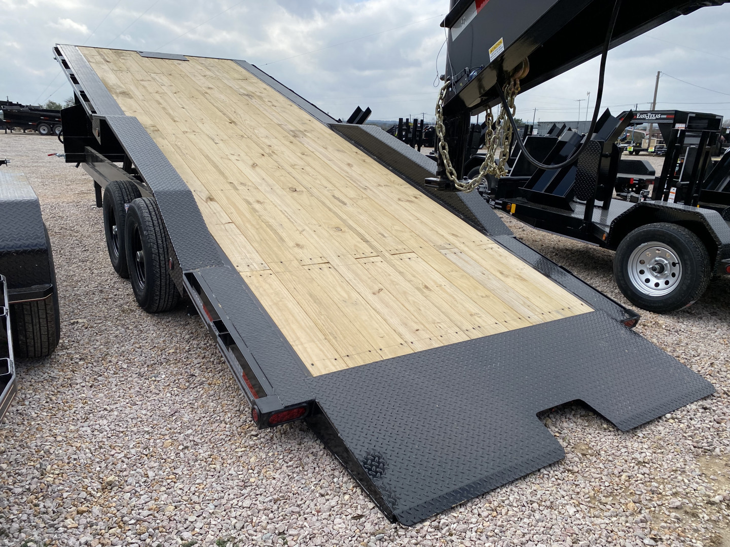 New 2025 East Texas Trailers - Drive Over Fender Power Tilt - 102 X 24 - Deckover Trailer