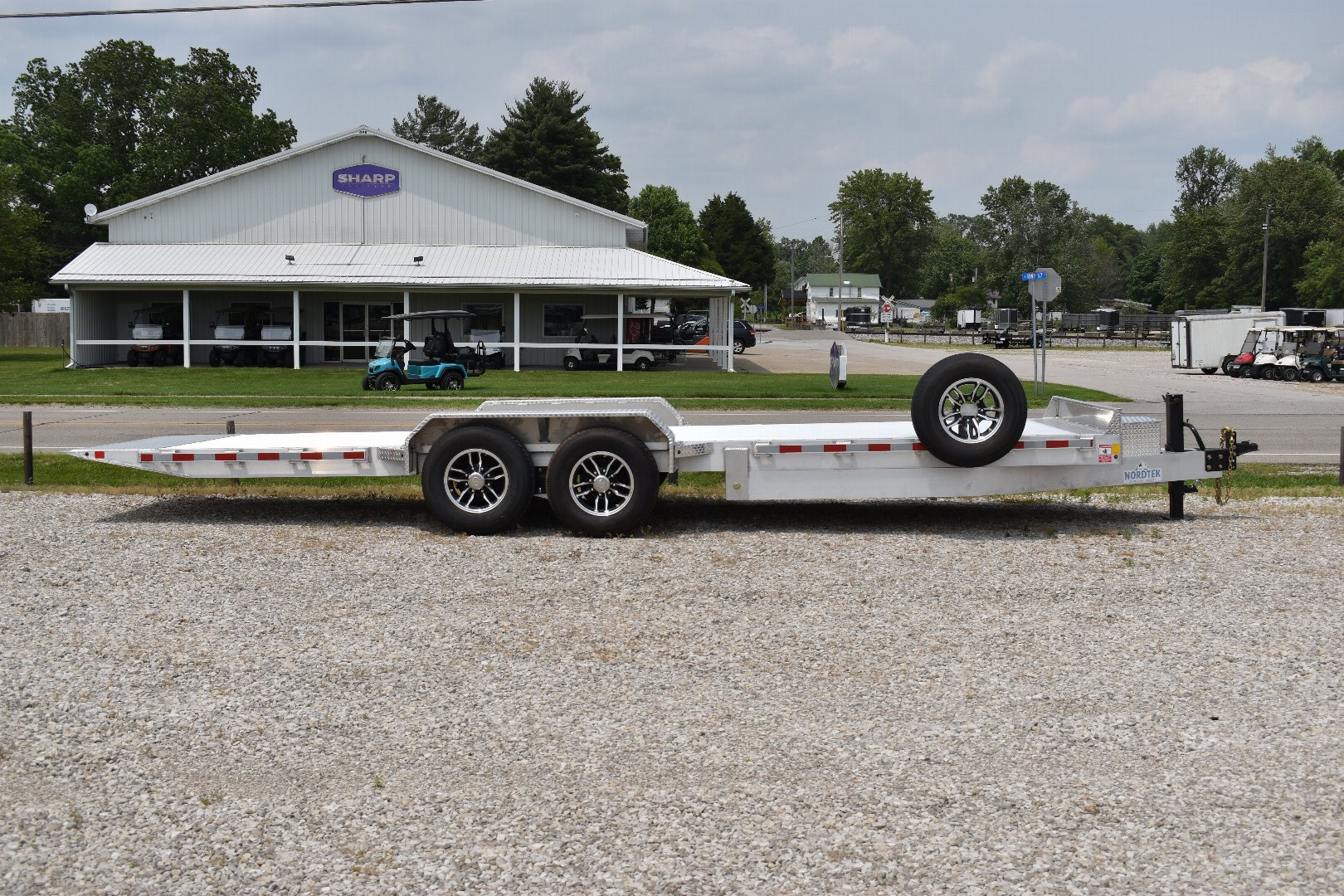 New TD82x24-14K POWER TILT EQUIPMENT TRAILER
