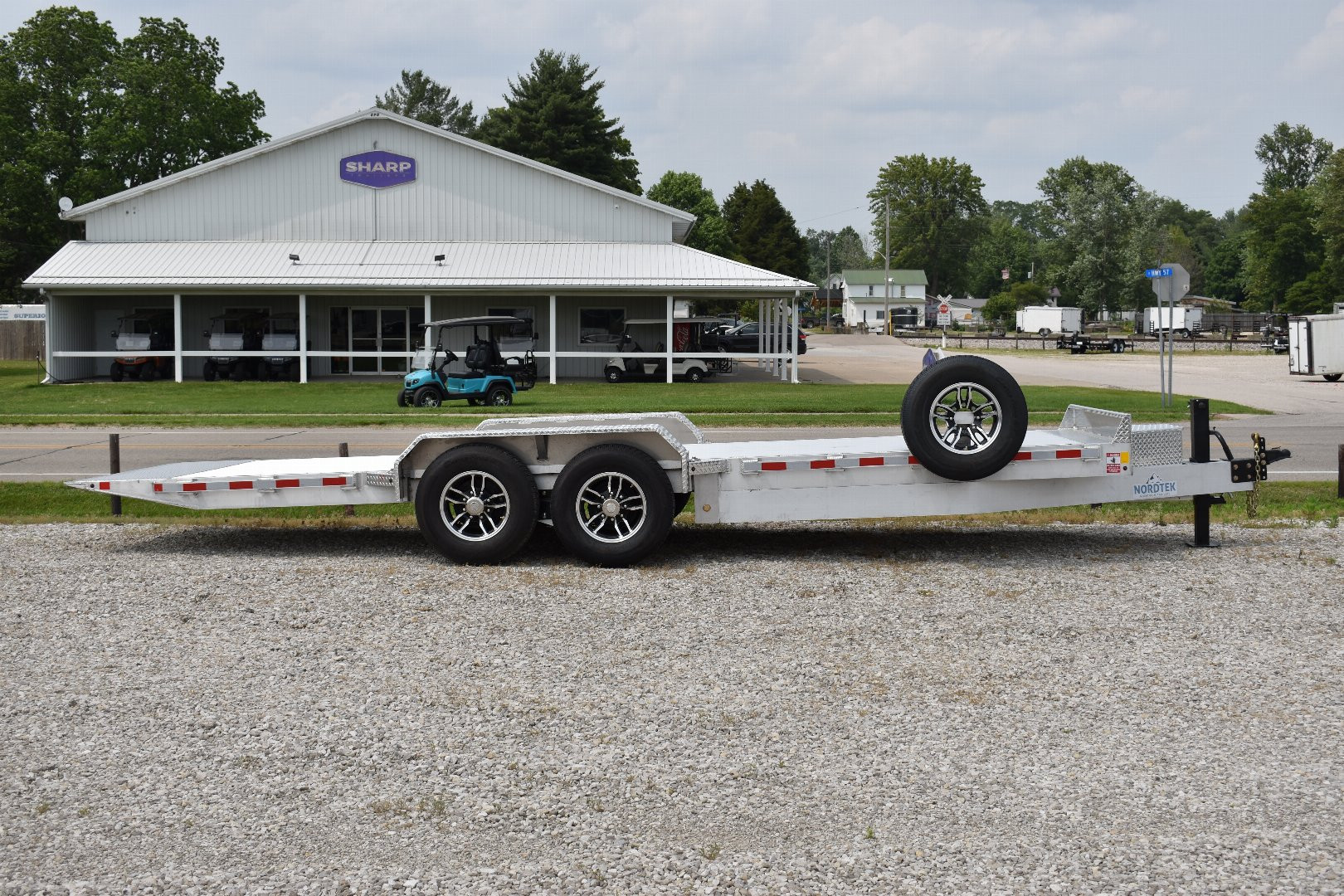New TD82x22-14K POWER TILT EQUIPMENT TRAILER