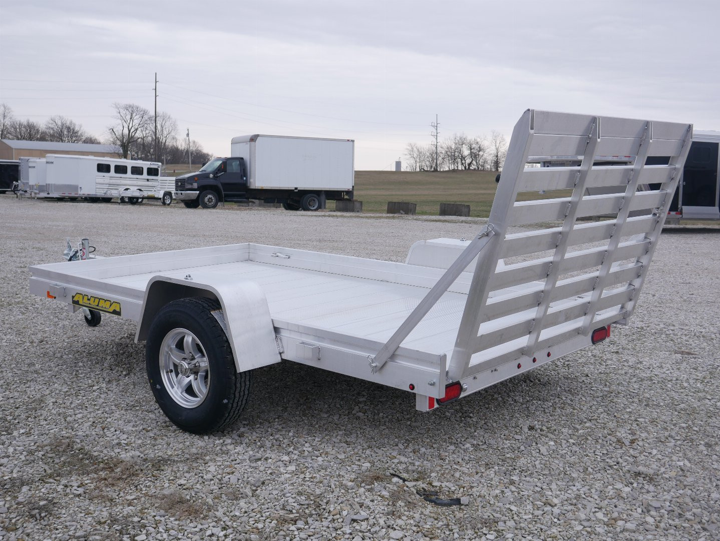 New 2025 Aluma 7210H-TG Utility Trailer