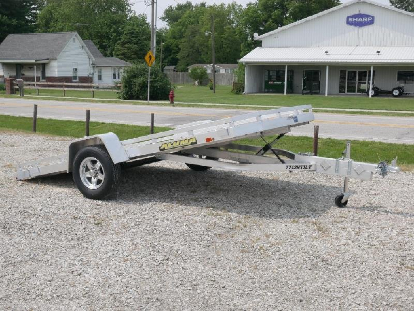 New 2024 Aluma 7712H-TILT Utility Trailer