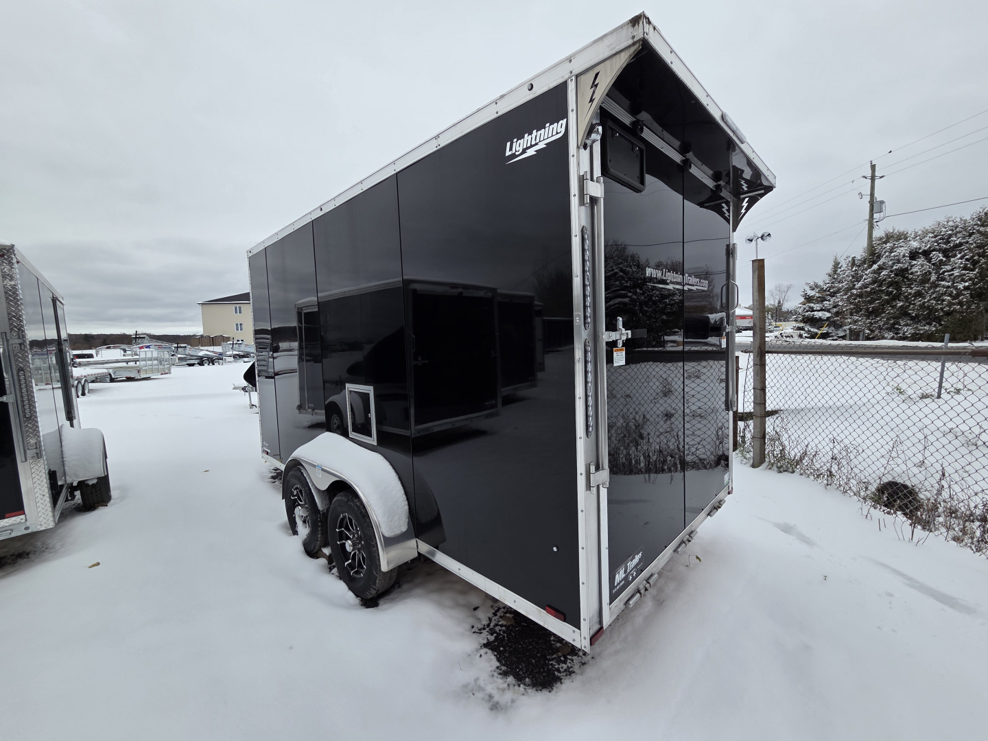 New 2025 LIGHTNING TRAILERS 7'x19' Inline Snowmobile Trailer