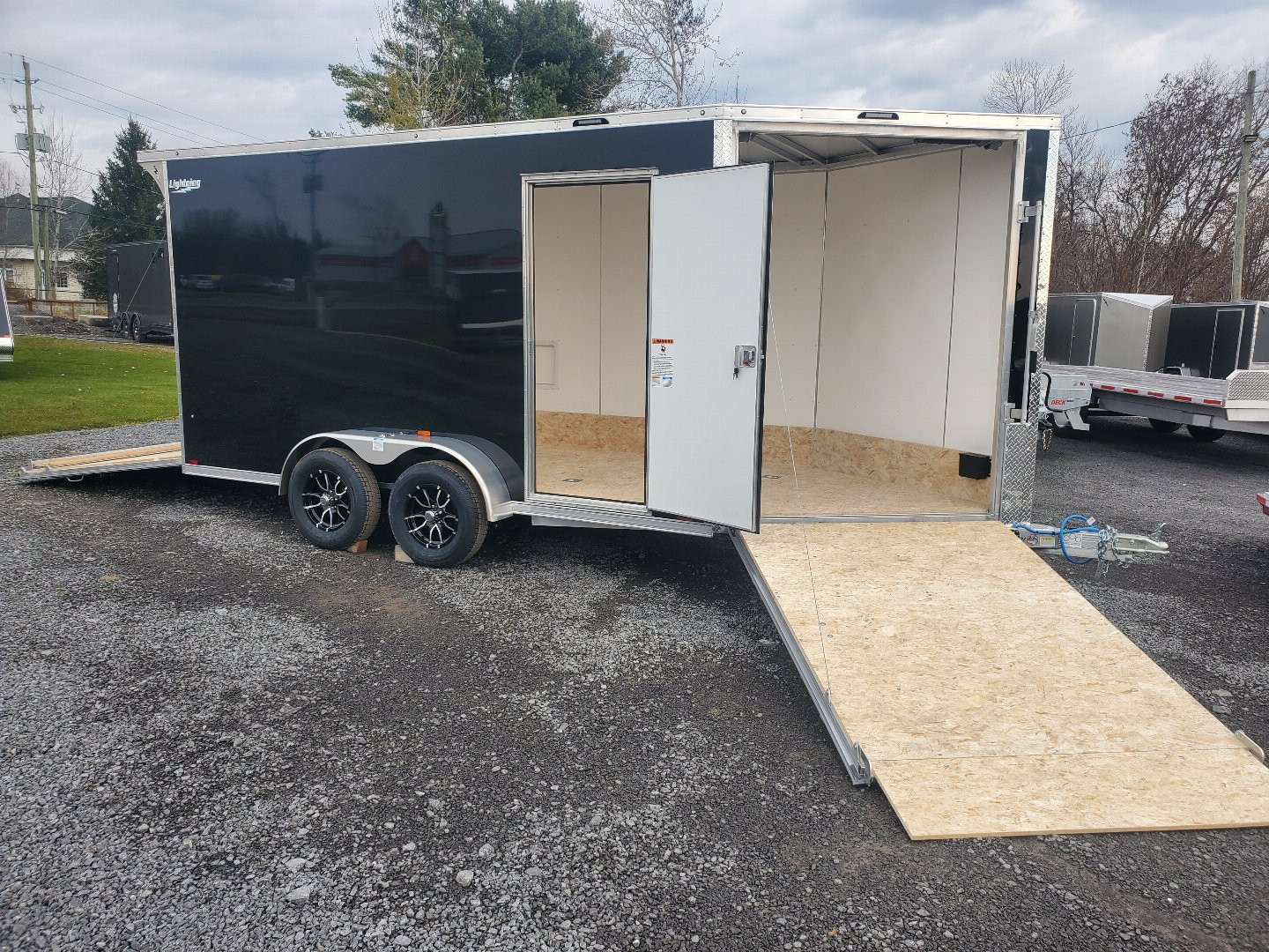 New 2025 LIGHTNING TRAILERS 7'x19' Inline Snowmobile Trailer