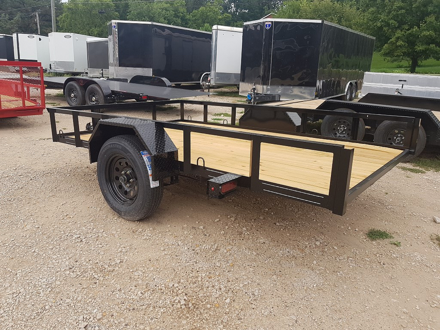 New 2025 MEB 77 x10 Angle Iron Tilt Utility Trailer w/Board Holders