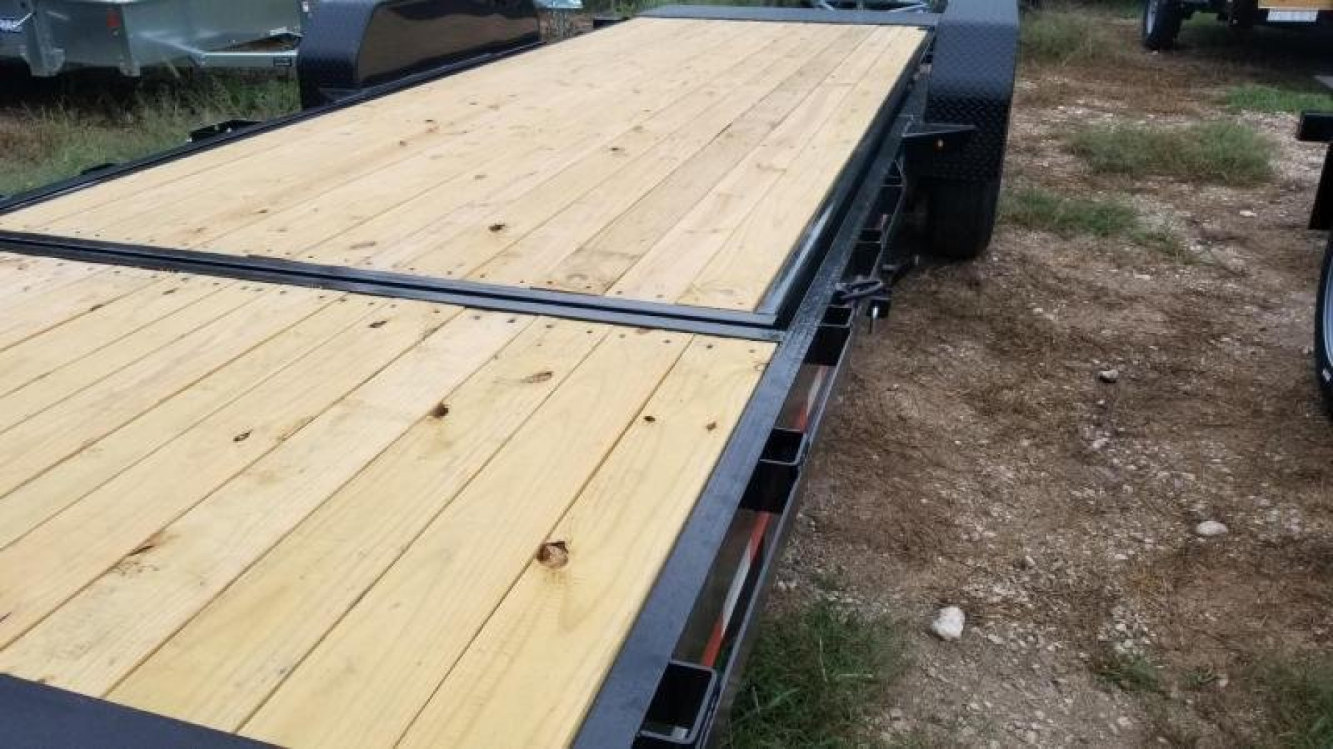 New 2025 Sure-Trac 7x18+4 Tilt Deck Equipment Trailer w/Stationary 14k