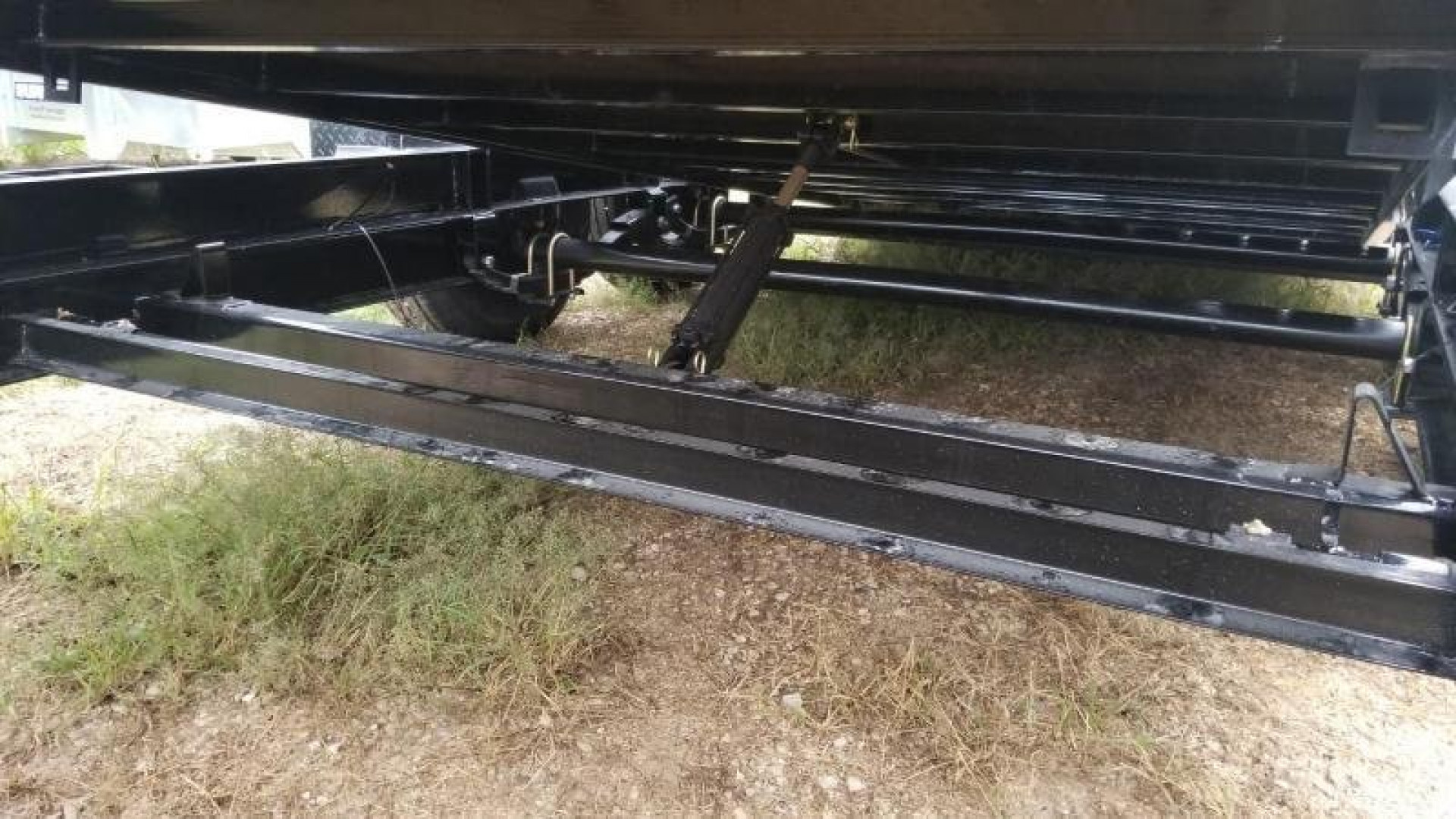 New 2025 Sure-Trac 7x18+4 Tilt Deck Equipment Trailer w/Stationary 14k