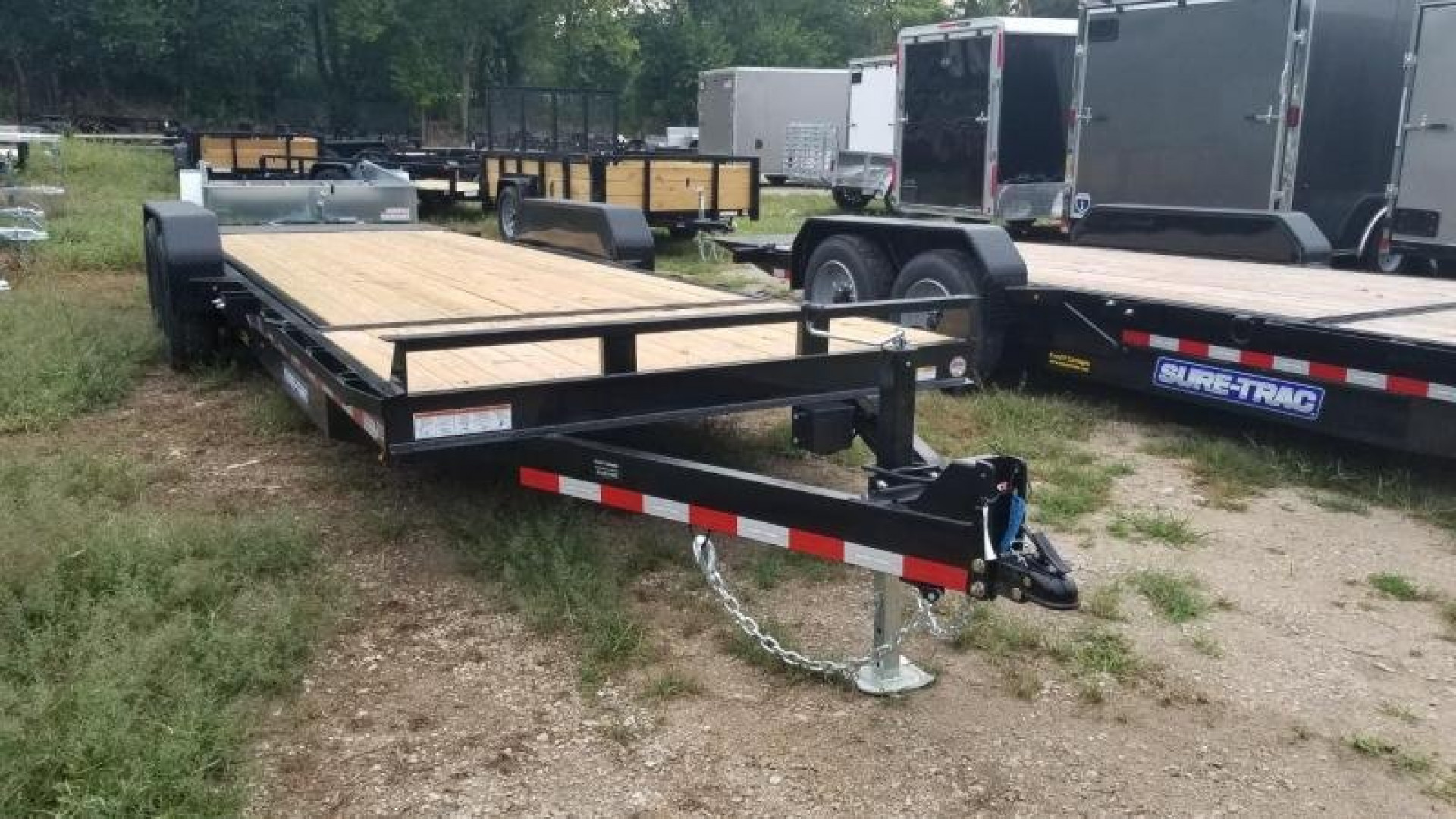 New 2025 Sure-Trac 7x18+4 Tilt Deck Equipment Trailer w/Stationary 14k