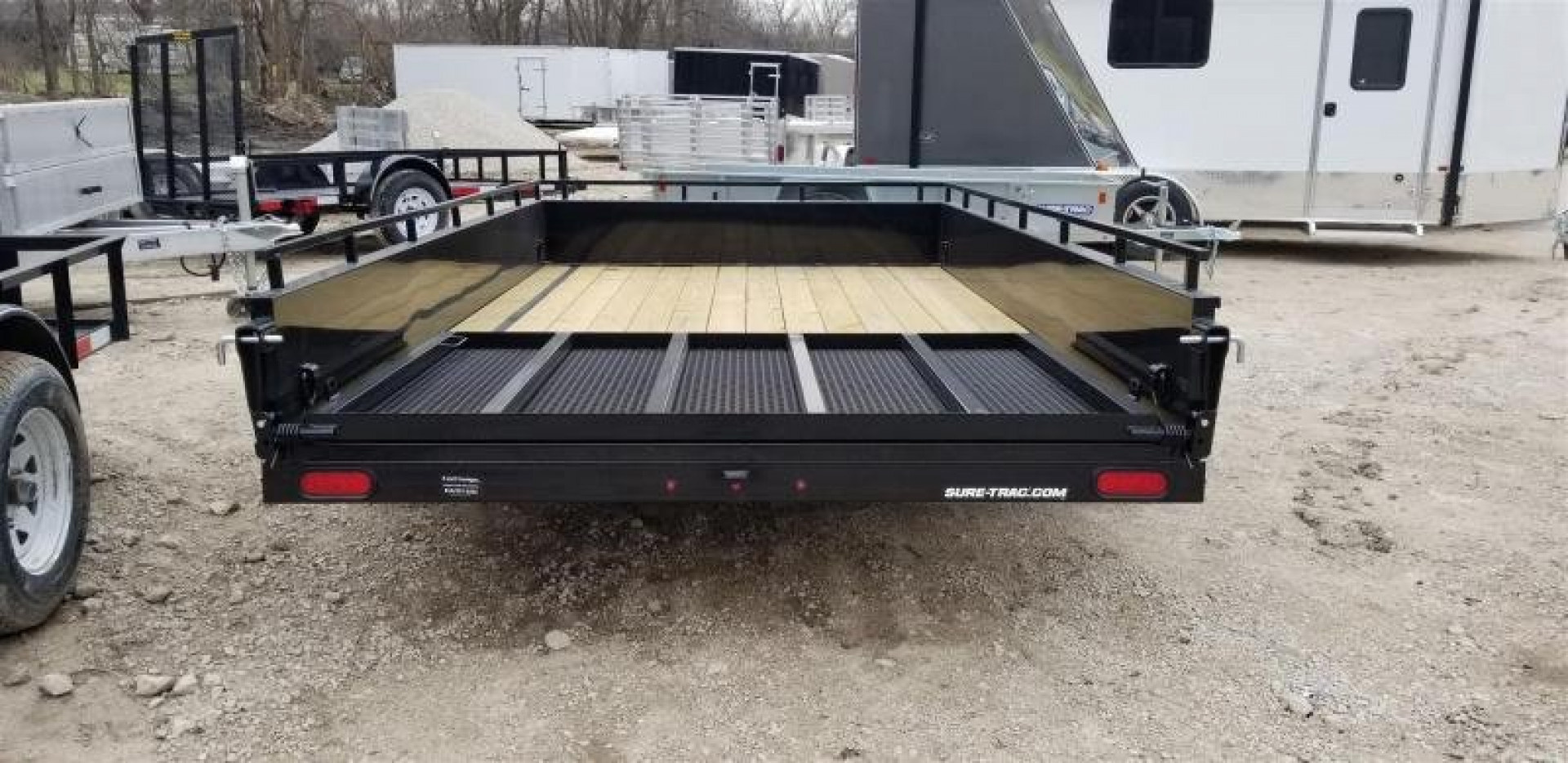 New 2026 Sure-Trac 7x12 Steel High Sided Utility Trailer w/Spring Assisted Gate
