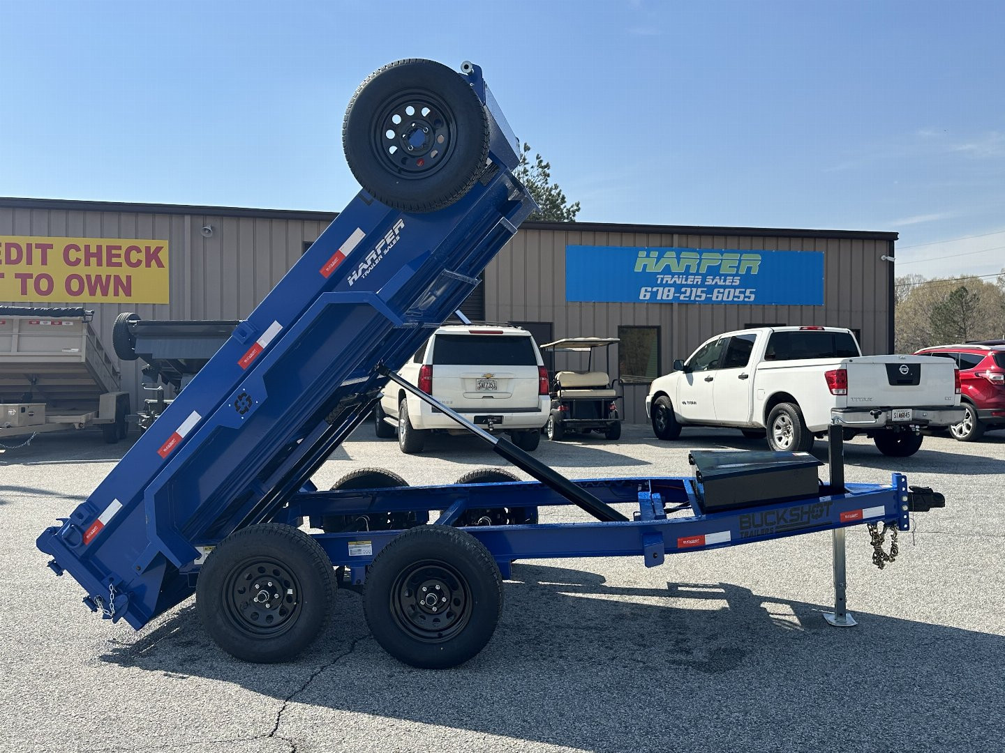 New 2025 BUCKSHOT 5X10 7K DUMP TRAILER 18" WALLS WITH SPARE TIRE