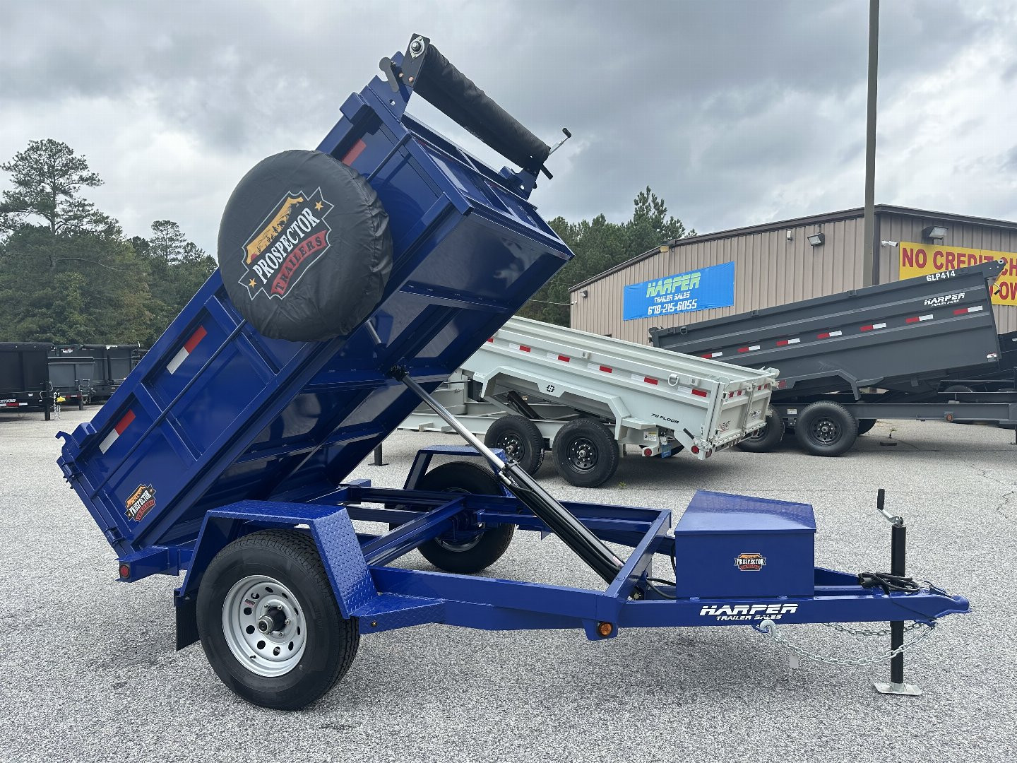 New 2025 PROSPECTOR 5X8 6K SINGLE AXLE DUMP TRAILER WITH 2' WALLS AND SPARE TIRE