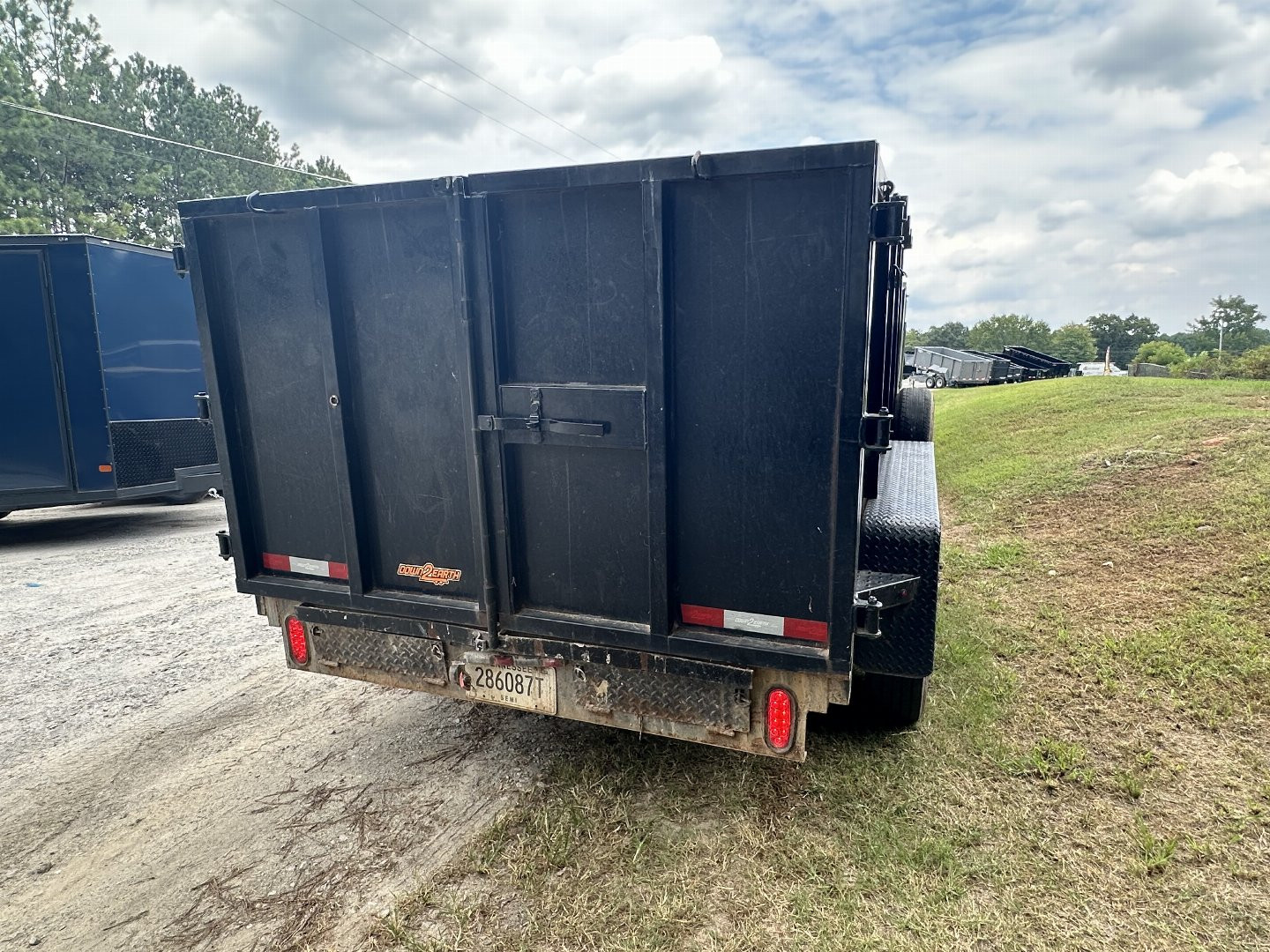 Used USED 2022 DOWN 2 EARTH 6X12 10K DUMP TRAILER WITH 4' WALLS ($676 ON RTO CONTRACT)