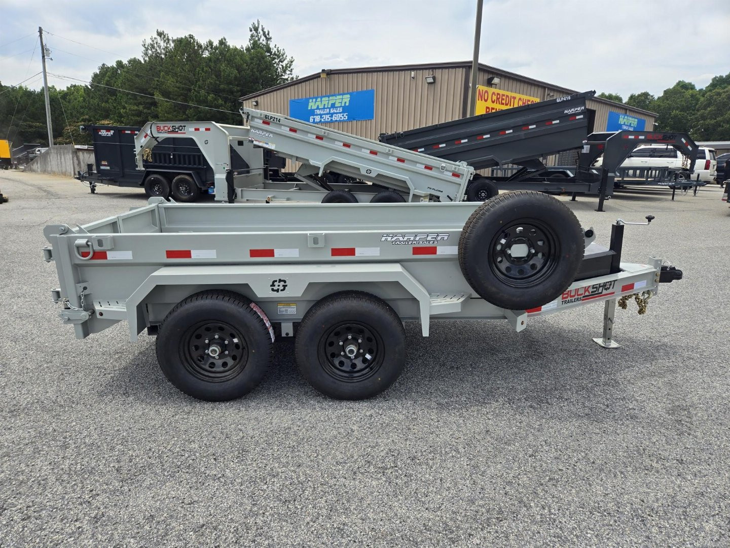 New 2024 BUCKSHOT 5X10 DUMP TRAILER 18" WALLS WITH SPARE TIRE