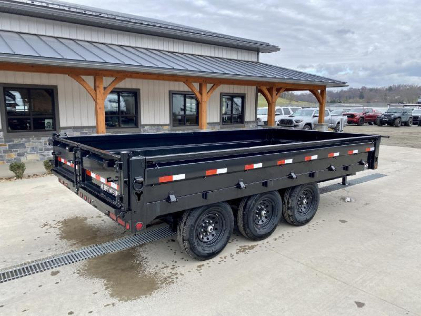 New 2025 Ironbull 8x16' Deckover Dump Trailer 21000# GVW * TRIPLE AXLE * TARP KIT * 10" I-BEAM FRAME * BED RUNNERS * 12K JACK * FOLD DOWN SIDES * OVERSIZE 5x20 SCISSOR * INTGRATED KEYWAY/10GA WALLS * IRONCLAD WARRANTY