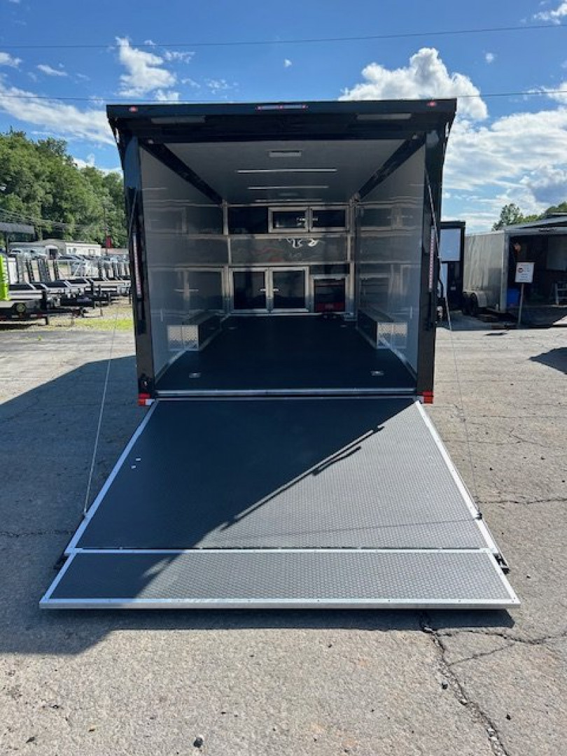 New 2025 Outlaw Trailers 8.5' x 24' Race Package Cargo / Enclosed Trailer