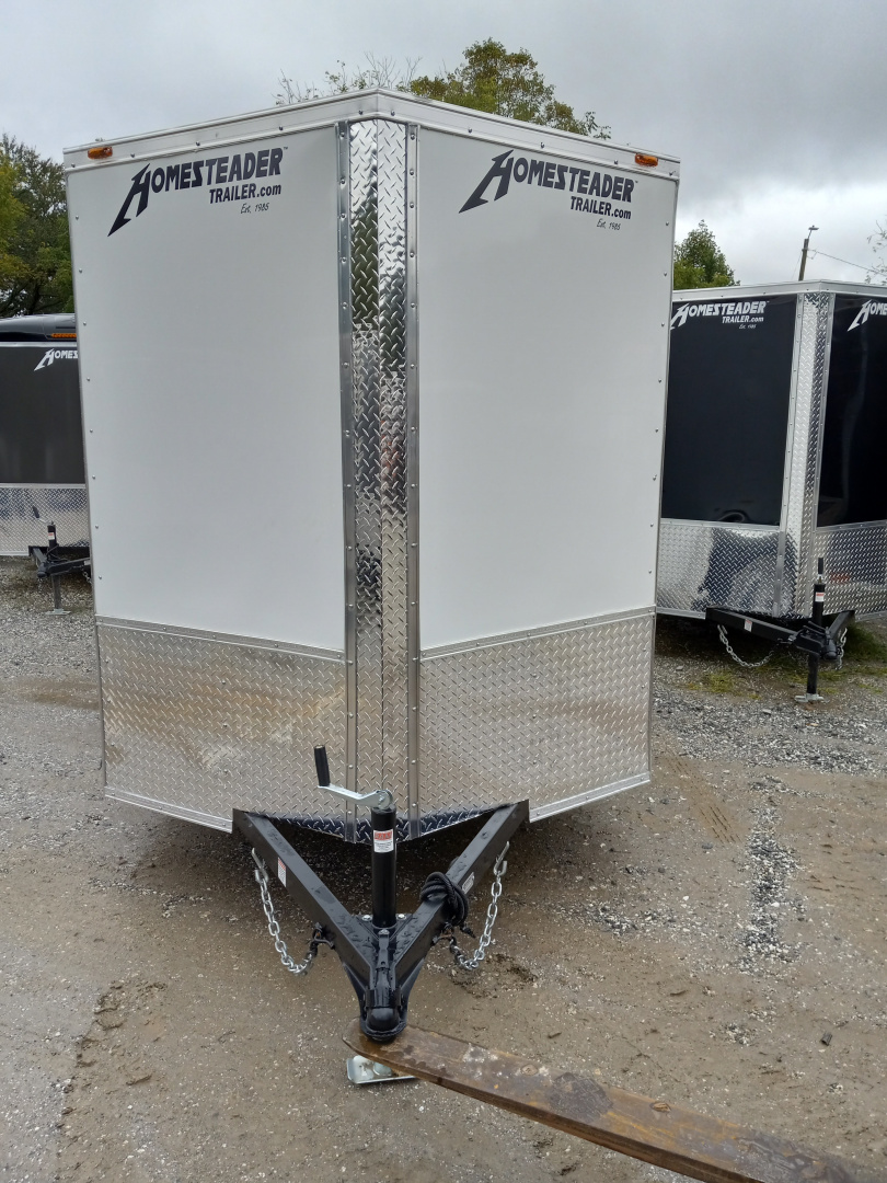 New 2026 Homesteader Trailer / 610IS Cargo / Enclosed Trailer / 6'6" Interior Height / White in color / Side Door and Ramp Rear Door