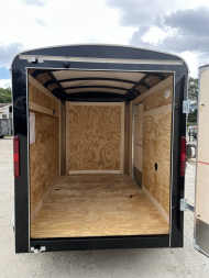 New 2026 Homesteader Trailer / Chalenger Series / 5x8 / 5'7" Interior Height / Single Swing Rear Door / 32" Side Door / 24" Stoneguard / .030 Black Aluminum
