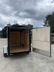 New 2026 Homesteader Trailer / Chalenger Series / 5x8 / 5'7" Interior Height / Single Swing Rear Door / 32" Side Door / 24" Stoneguard / .030 Black Aluminum