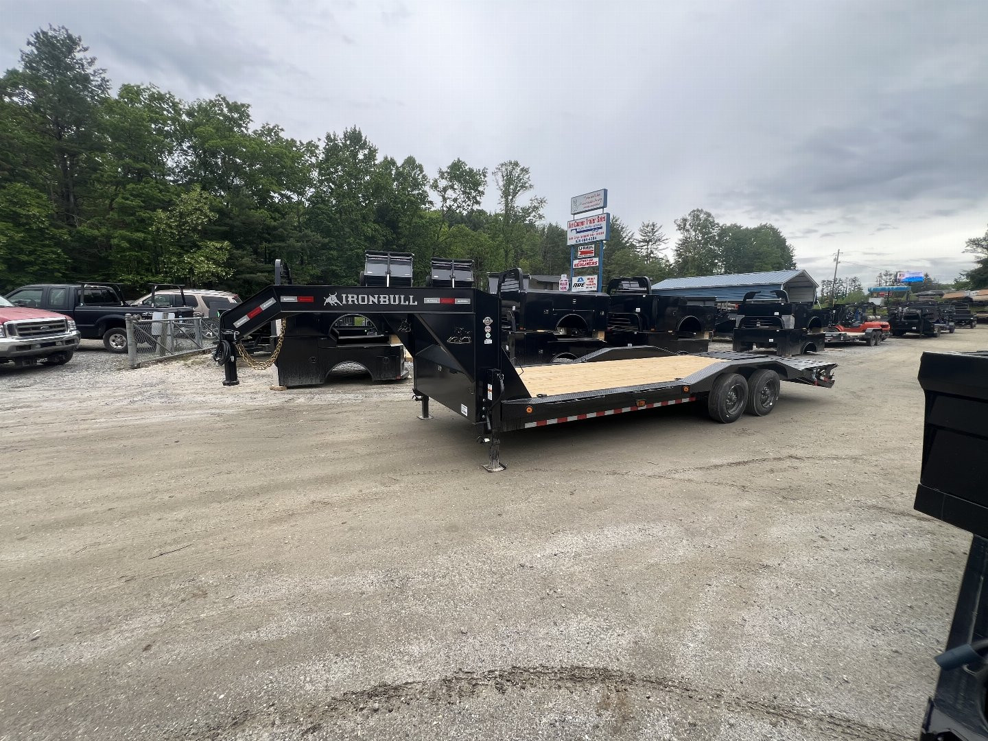 New 2025 Iron Bull ETG0224082 Gooseneck Equipment Trailer / 102" Wide x 24' Long / Driveover Fender / 20' Flat 4' Dovetail / Rampage Ramps / 2-8,000# Axles / 215/75R17.5" Tires and Wheels