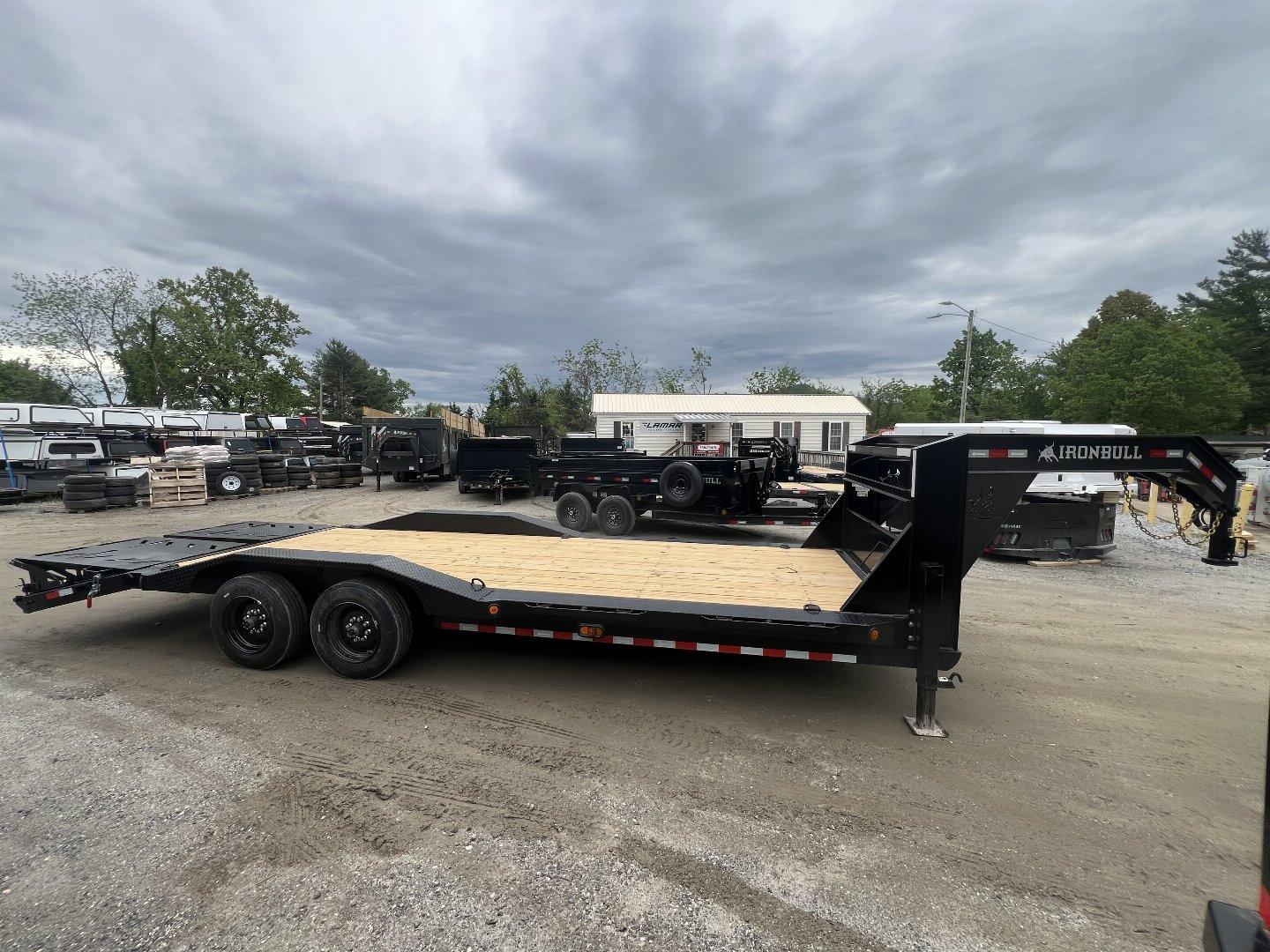 New 2025 Iron Bull ETG0224082 Gooseneck Equipment Trailer / 102" Wide x 24' Long / Driveover Fender / 20' Flat 4' Dovetail / Rampage Ramps / 2-8,000# Axles / 215/75R17.5" Tires and Wheels