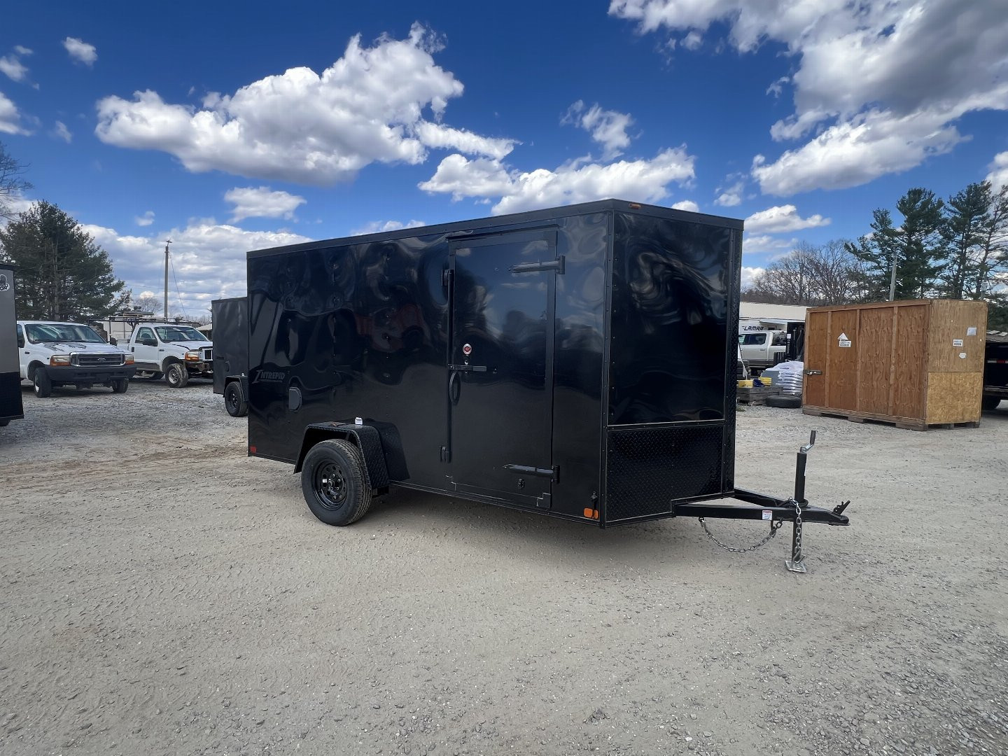 New 2025 Homesteader Trailer / 612IS / 6' wide x 12' Long / 32" Side Door / Ramp Rear Door / 6' Interior Height / .030 Black Aluminum w/ Black Out Pkg