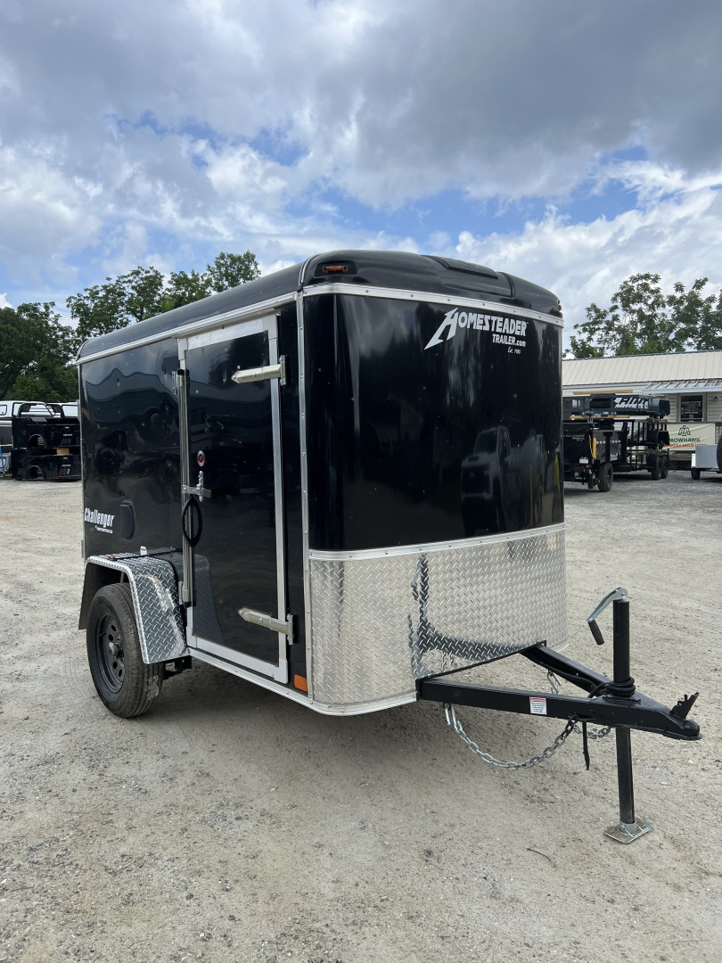 New 2025 Homesteader Trailer / Chalenger Series / 5x8 / 5'7" Interior Height / Single Swing Rear Door / 32" Side Door / 24" Stoneguard / .030 Black Aluminum