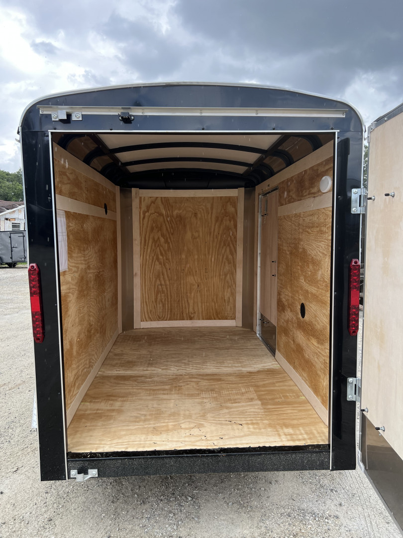 New 2025 Homesteader Trailer / Chalenger Series / 5x8 / 5'7" Interior Height / Single Swing Rear Door / 32" Side Door / 24" Stoneguard / .030 Black Aluminum