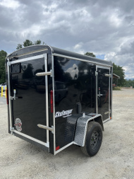 New 2025 Homesteader Trailer / Chalenger Series / 5x8 / 5'7" Interior Height / Single Swing Rear Door / 32" Side Door / 24" Stoneguard / .030 Black Aluminum