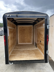 New 2025 Homesteader Trailer / Chalenger Series / 5x8 / 5'7" Interior Height / Single Swing Rear Door / 32" Side Door / 24" Stoneguard / .030 Black Aluminum