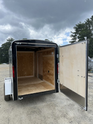 New 2025 Homesteader Trailer / Chalenger Series / 5x8 / 5'7" Interior Height / Single Swing Rear Door / 32" Side Door / 24" Stoneguard / .030 Black Aluminum